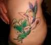 hummingbird tat with flower